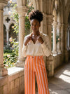 Bold Striped Wide-Leg Pants - Orange - Lifestyle editorial shot