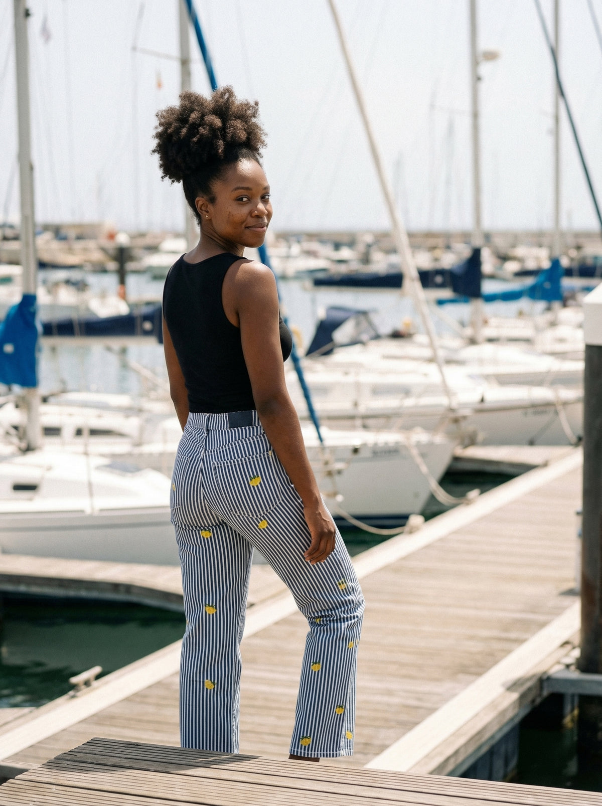 Pinstripe Lemon Pants - Striped - Lifestyle editorial shot